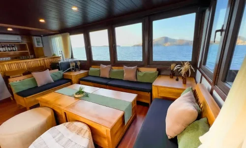 Lounge area in Neptune Cruise Phinisi - Boat Komodo Trip