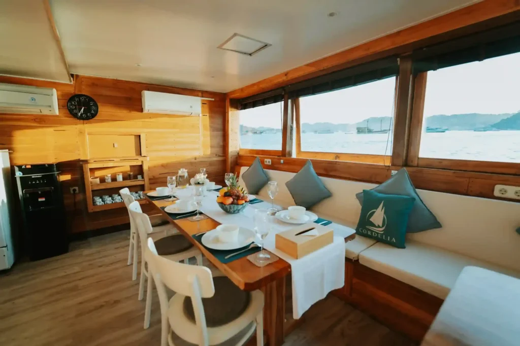 Cordelia Yacht Cruise Indoor Dining Area | Boat Komodo Trip