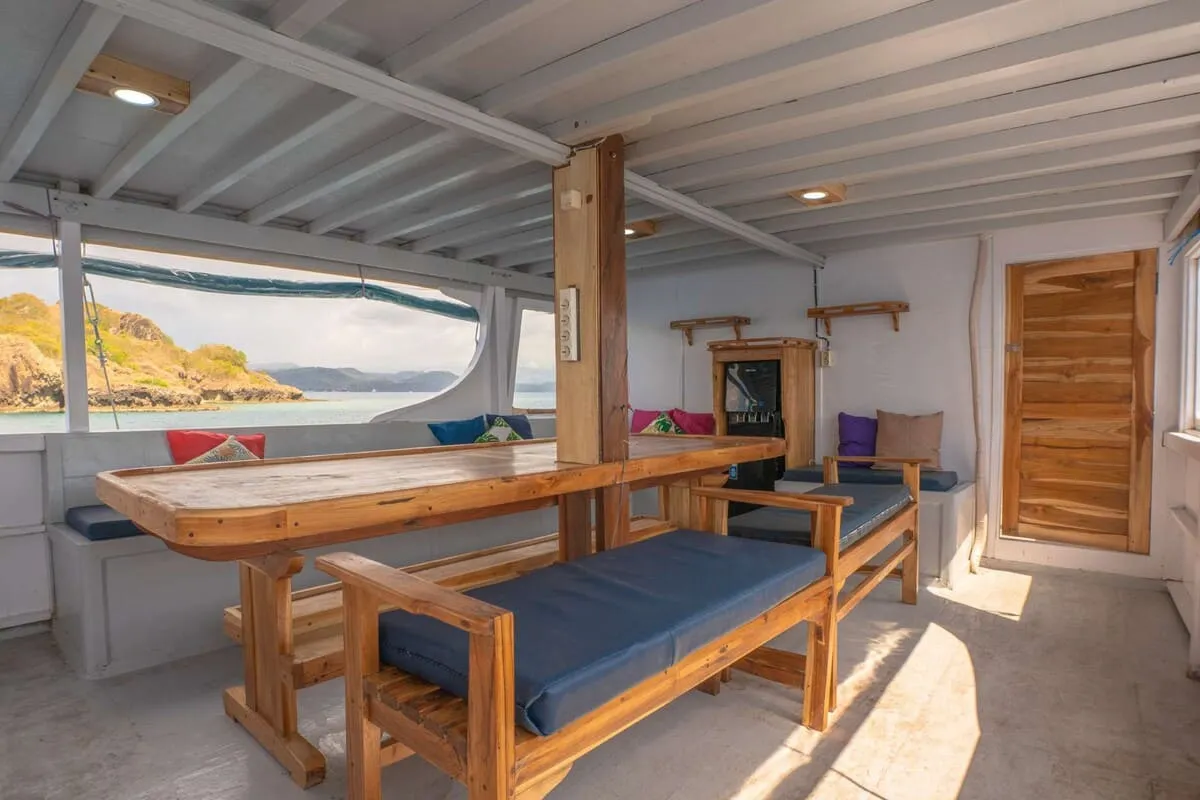 Dining Area in IJC Phinisi Cruise - BoatKomodoTrip