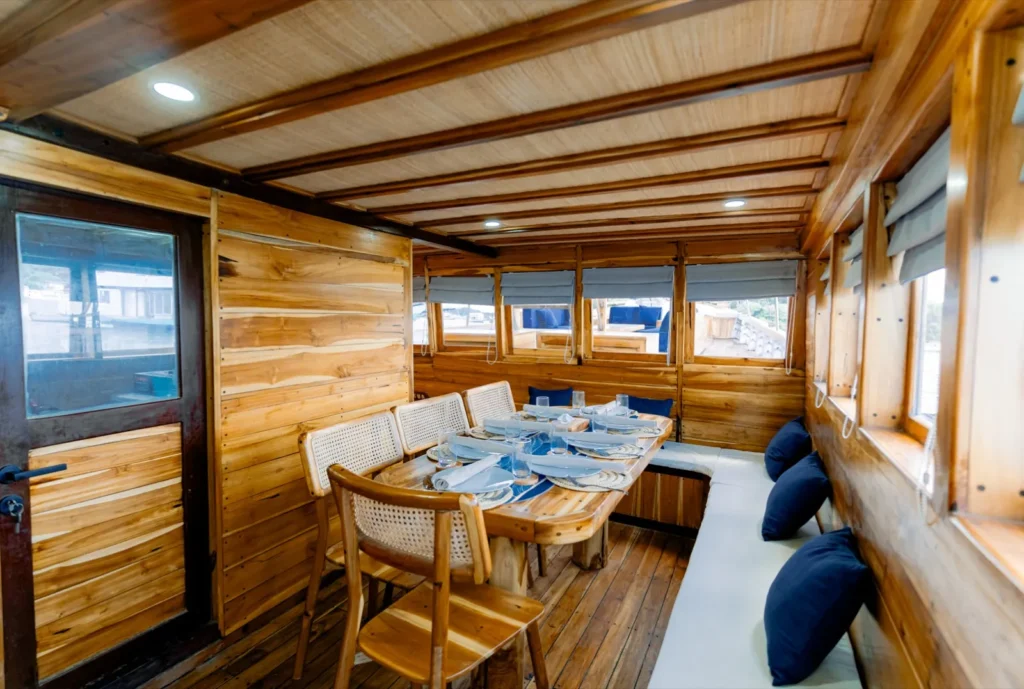 Indoor Dining Area in Barakati Phinisi | Komodo Island tour | Boat Komodo Trip