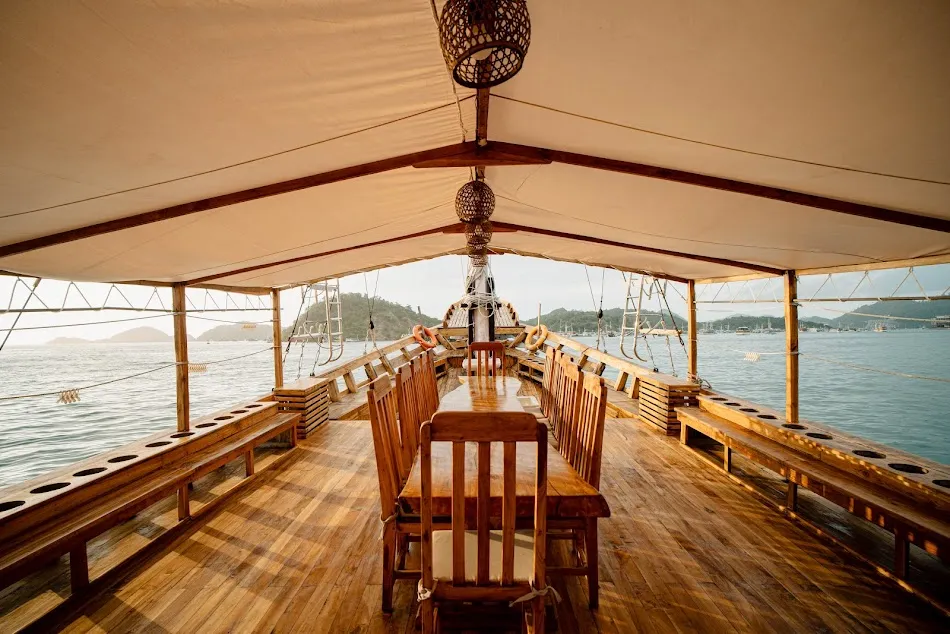 Maipa Deapati Phinisi Boat Charter | Outdoor Dining Area | Komodo Tour | Boat Komodo Trip