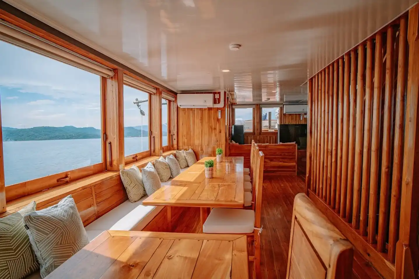 Indoor Dining Area on Alore Phinisi | Komodo Island Tour | Boat Komodo Trip
