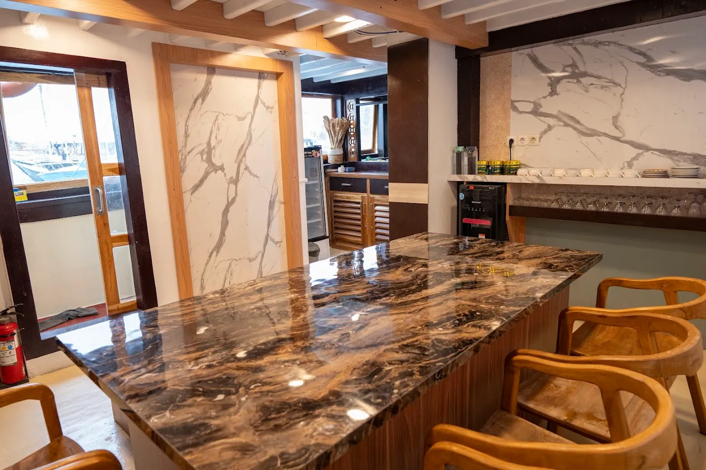 Alfathran Phinisi Boat Charter | Alfathran Indoor Dining Area | Boat Komodo Trip