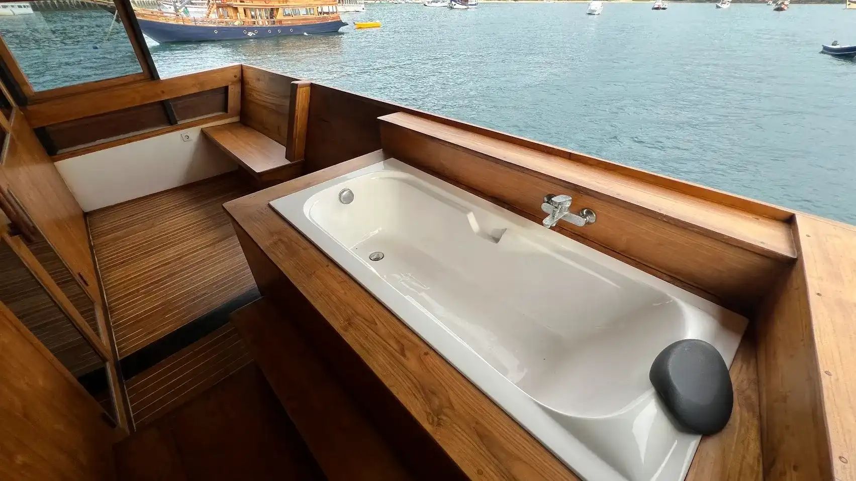 Panrita Liveaboard Cruise Phinisi Baot Charter | Panrita Suite Cabin Balcony | Komodo Tour | Boat Komodo Trip