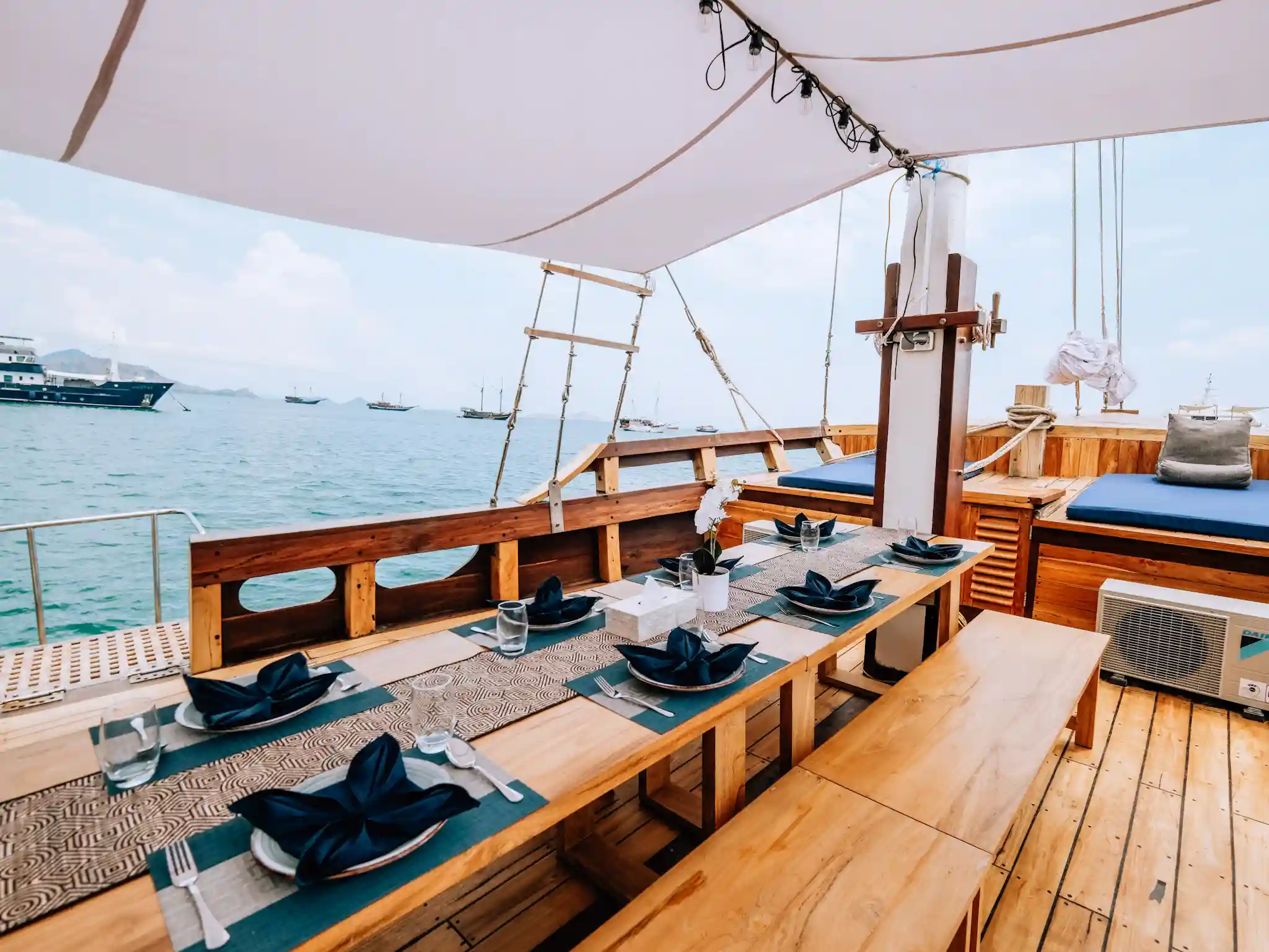 Outdoor Dining & Front Deck Area | Kanthaka Phinisi Boat Charter | Komodo Tour | Boat Komodo Trip